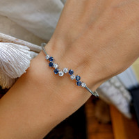 0.62 Ct.Tw. Blue Sapphire and Natural Diamond Bangle Bracelet, 14K White Gold Image