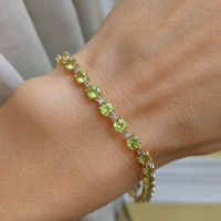 7.90 Ct.Tw. Peridot 14K Yellow Gold bracelet
