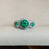 1.64 Ct. Emerald Emerald Three Stone Ring, 18K White Gold Life Style
