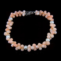 39.70 Ct.Tw. Coral Pearl Tennis/Riviere Bracelet, 18K White Gold Video