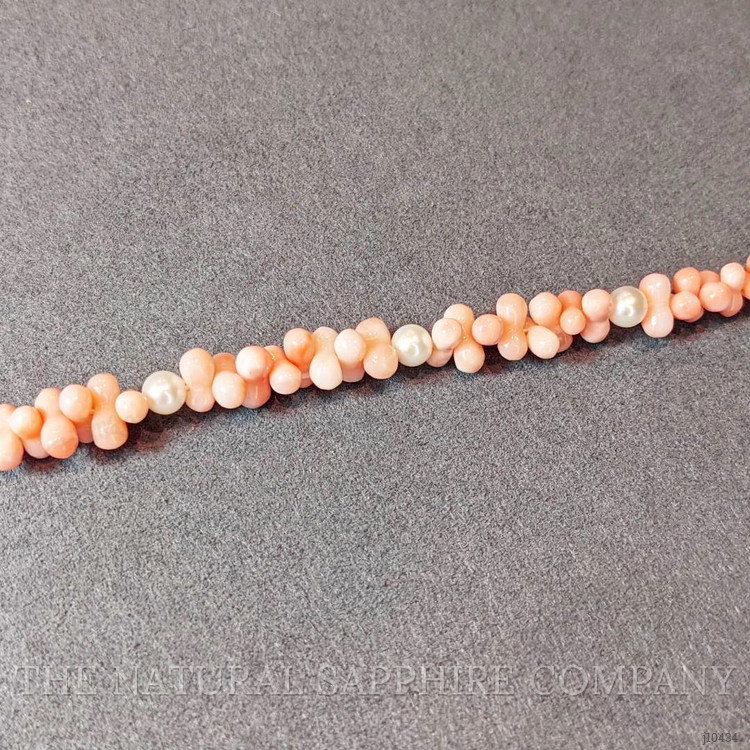 39.70 Ct.Tw. Coral Pearl Tennis/Riviere Bracelet, 18K White Gold