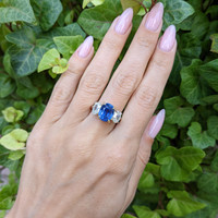 5.54 Ct. Blue Sapphire and Natural Diamond Three Stone Ring, Platinum & 18K Yellow Life Style