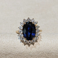 5.64 Ct. Blue Sapphire and Natural Diamond Halo Ring, 14K Yellow Gold Life Style