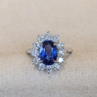 3.03 Ct. Blue Sapphire and Natural Diamond Halo Ring, 18K White Gold Life Style