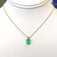 2.31 Ct. Emerald Solitaire Pendant, 18K Yellow Gold Life Style