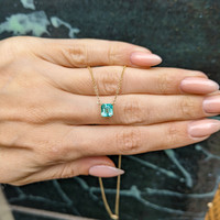 1.27 Ct. Emerald Solitaire Necklace, 18K Yellow Gold Life Style