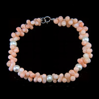 33.90 Ct.Tw. Coral Pearl Tennis/Riviere Bracelet, 18K White Gold Video