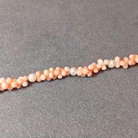 33.90 Ct.Tw. Coral Pearl Tennis/Riviere Bracelet, 18K White Gold Life Style