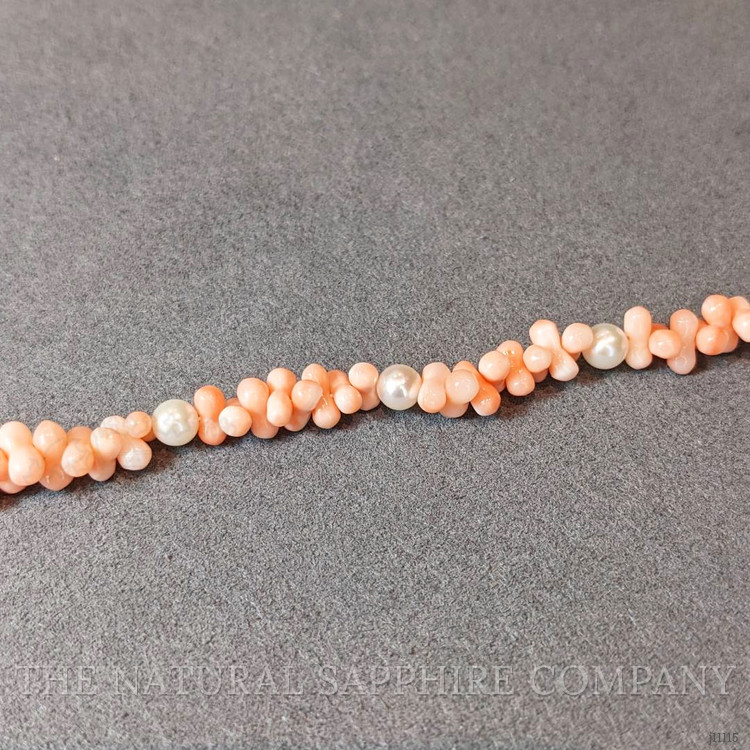 33.90 Ct.Tw. Coral Pearl Tennis/Riviere Bracelet, 18K White Gold