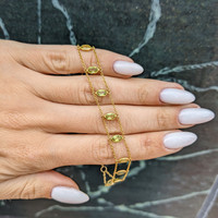 3.21 Ct.Tw. Peridot Bezel Bracelet, 14K Yellow Gold Life Style