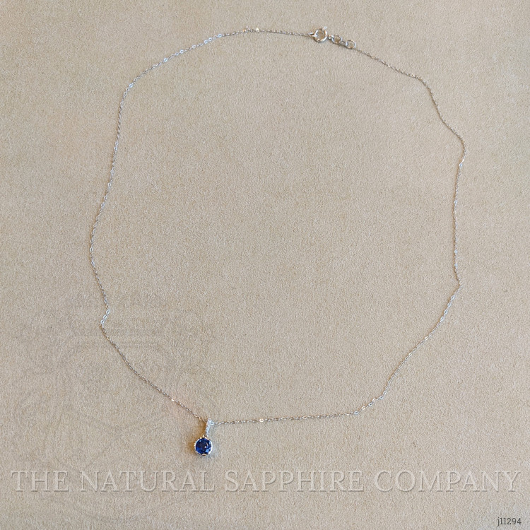 0.72 Ct. Blue Sapphire and Natural Diamond Bezel Pendant, 14K White Gold