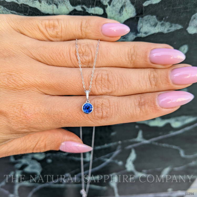 0.72 Ct. Blue Sapphire and Natural Diamond Bezel Pendant, 14K White Gold