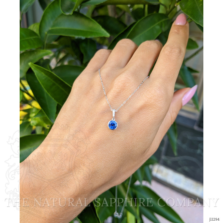 0.72 Ct. Blue Sapphire and Natural Diamond Bezel Pendant, 14K White Gold