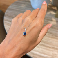 0.72 Ct. Blue Sapphire and Natural Diamond Bezel Pendant, 14K White Gold Life Style