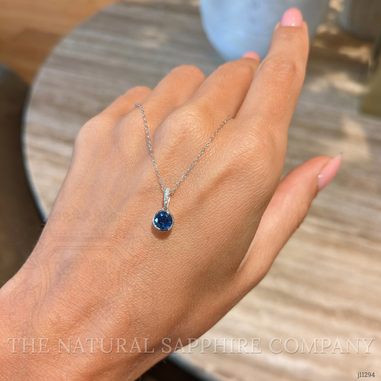 0.72 Ct. Blue Sapphire and Natural Diamond Bezel Pendant, 14K White Gold