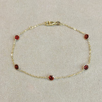 1.75 Ct.Tw. Garnet Tennis/Riviere Bracelet, 14K Yellow Gold Image