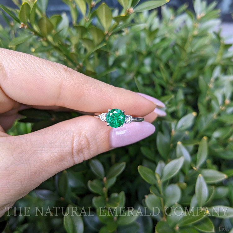 1.29 Ct. Emerald and Natural Diamond Three Stone Ring, 18K White Gold