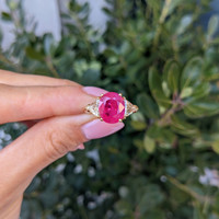 4.14 Ct. Pinkish Red Ruby and Natural Diamond Three Stone Ring, 18K Yellow Gold Life Style