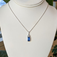 2.57 Ct. Blue Sapphire and Natural Diamond Bezel Pendant, 18K White Gold Life Style