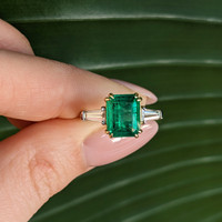 3.11 Ct. Emerald and Natural Diamond Three Stone Ring, Platinum & 18K Yellow Life Style