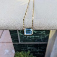 7.80 Ct. Blue Aquamarine Bezel Necklace, 14K Yellow Gold Life Style