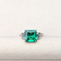 3.47 Ct. Emerald and Natural Diamond Three Stone Ring, 18K White Gold Life Style