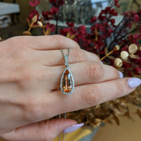 4.29 Ct. Pinkish Orange Imperial Topaz and Natural Diamond Pave Pendant, 18K White & Yellow Life Style