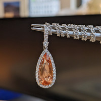 4.29 Ct. Pinkish Orange Imperial Topaz and Natural Diamond Pave Pendant, 18K White & Yellow Life Style