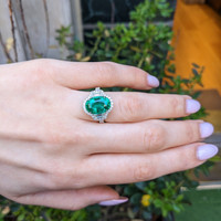 4.66 Ct. Emerald and Natural Diamond Pave Ring, 18K White Gold Life Style