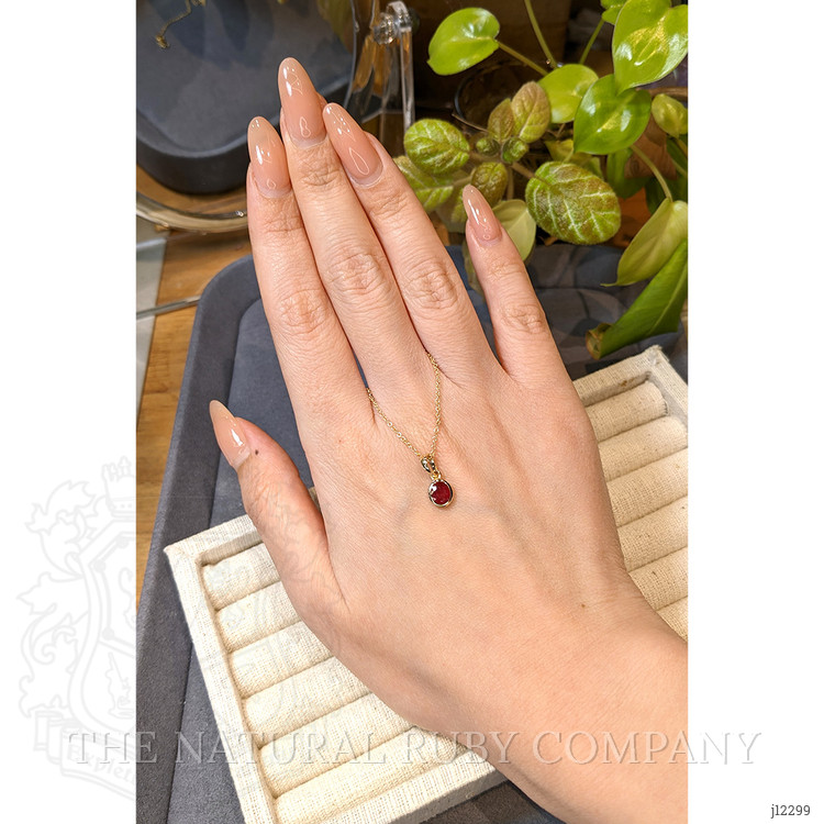 0.61 Ct. Ruby Bezel Pendant, 14K Yellow Gold