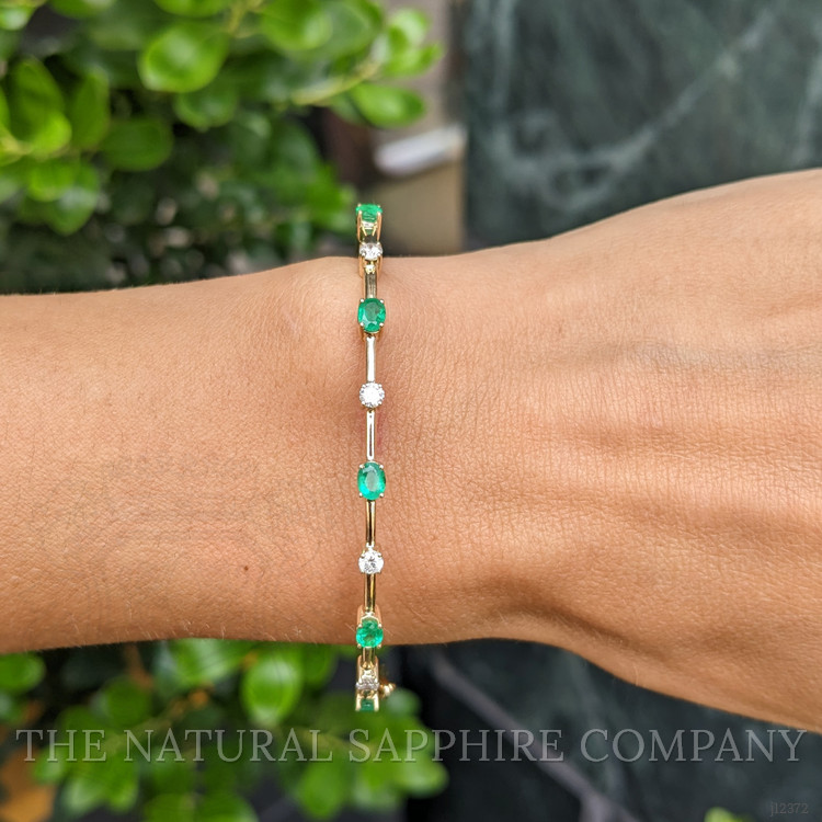 0.87 Ct.Tw. Emerald and Natural Diamond Bangle Bracelet, 14K Yellow Gold