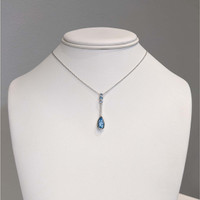 1.82 Ct. Blue Topaz and Natural Diamond Bezel Pendant, Silver Life Style