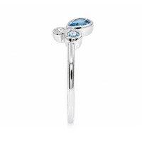0.48 Ct. Blue Topaz and Natural Diamond Bezel Ring, Silver Image
