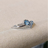0.48 Ct. Blue Topaz and Natural Diamond Bezel Ring, Silver Life Style