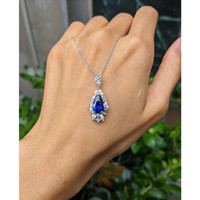 2.62 Ct. Blue Sapphire and Natural Diamond Halo Pendant, Platinum 950 Life Style