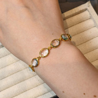 40.60&nbsp;Ct.Tw.Total Carat Weight Blue Topaz Bezel Bracelet, 22K Gold Plated Silver Life Style