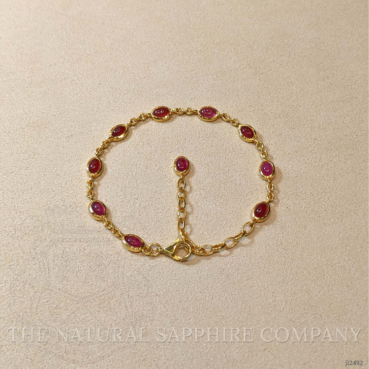 6.30 Ct.Tw. Purplish Red Ruby Bezel Bracelet, 22K Gold Plated Silver