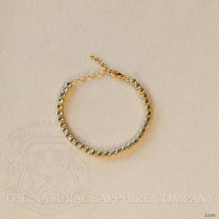 6.47 Ct.Tw. Blue Topaz Bezel Bracelet, 22K Gold Plated Silver