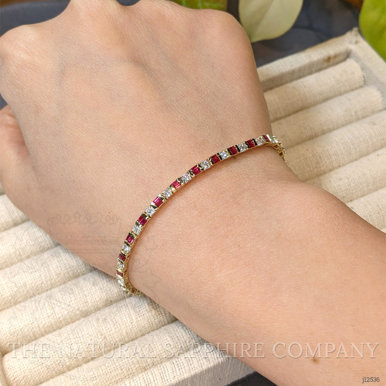 3.15 Ct.Tw. Purplish Red Ruby and Natural Diamond Tennis/Line Bracelet, 14K Yellow Gold