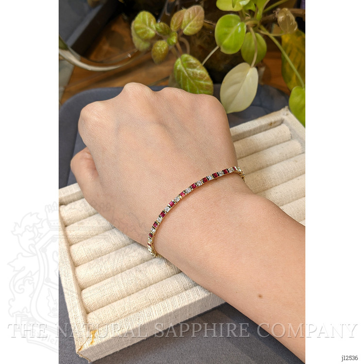 3.15 Ct.Tw. Purplish Red Ruby and Natural Diamond Tennis/Line Bracelet, 14K Yellow Gold