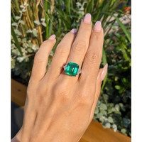 7.02 Ct. Emerald and Natural Diamond Three Stone Ring, Platinum 950 Life Style