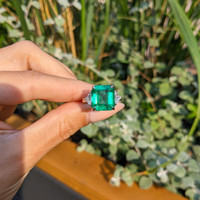 7.02 Ct. Emerald and Natural Diamond Three Stone Ring, Platinum 950 Life Style