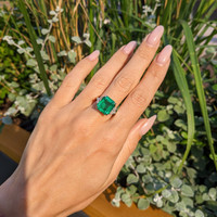 7.02 Ct. Emerald and Natural Diamond Three Stone Ring, Platinum 950 Life Style