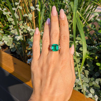 7.02 Ct. Emerald and Natural Diamond Three Stone Ring, Platinum 950 Life Style