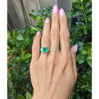 2.69 Ct. Emerald and Natural Diamond Three Stone Ring, Platinum 950 Life Style