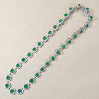 34.74 Ct. Emerald and Natural Diamond Halo Necklace, 18K White Gold Life Style