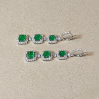 34.74 Ct. Emerald and Natural Diamond Halo Necklace, 18K White Gold Life Style