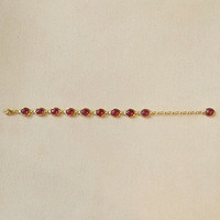 34.00&nbsp;Ct.Tw.Total Carat Weight Pinkish Red Ruby Bezel Bracelet, 22K Gold Plated Silver Life Style