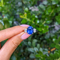 4.57 Ct. Blue Sapphire and Natural Diamond Three Stone Ring, Platinum 950 Life Style