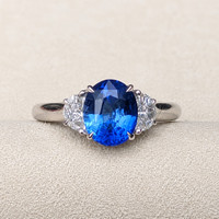 2.24 Ct. Blue Sapphire and Natural Diamond Three Stone Ring, 18K White Gold Life Style